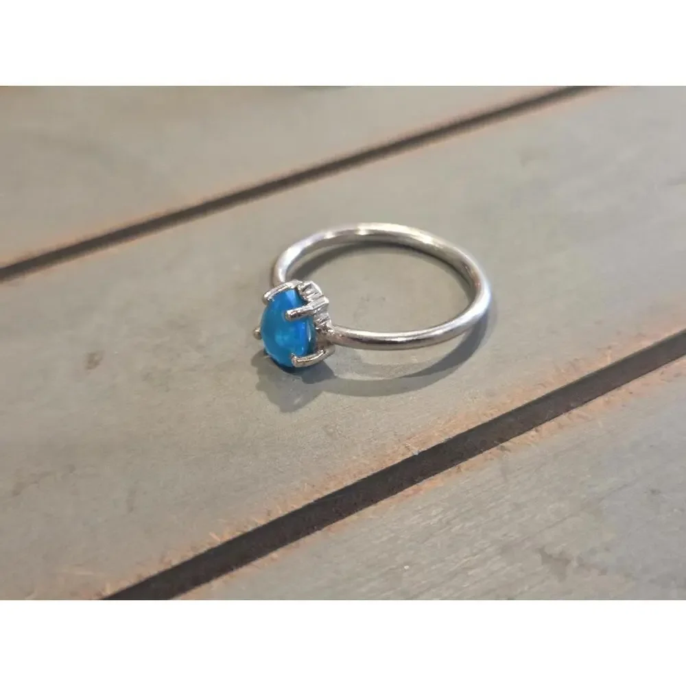 Sterling Silver Ring with Blue Opal Teardrop Stone